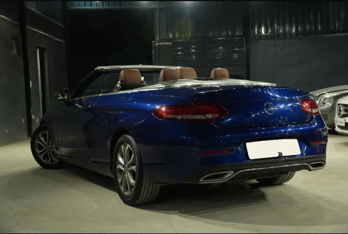Back view of the Mercedes Benz C-Class Cabriolet, book this luxury car rental in Goa.